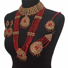 bridal jewellery set. Set includes- Necklace  Mala  Earrings  Jhumar  Tikka  1 Panjagla  Nose ring Red Chandbali Bridal Necklace For Wedding, Red Bridal Earrings For Festive Wedding, Red Bridal Earrings For Wedding, Festive Red Bridal Earrings For Wedding, Elegant Red Bridal Sets With Stone Work, Red Kundan Bridal Sets With Stone Work, Red Tilla Jewelry For Marriage, Red Stone Work Bridal Sets For Wedding, Red Meenakari Bridal Earrings For Wedding