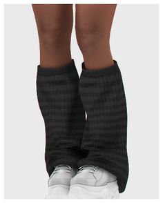 the legs and feet of a person wearing black socks