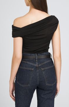 Designed in a sweet shoulder-baring silhouette, this stretchy and versatile jersey bodysuit is the perfect piece to start off your next OOTD. Snap closure One-shoulder neck Short sleeves 95% polyester, 5% elastane Hand wash, dry flat Imported Stretch Off-shoulder Bodysuit For Evening, Stretch Off-shoulder Evening Bodysuit, Black Stretch Off-shoulder Top In Elastane, Black Off-shoulder One Shoulder Top, Black Stretch Elastane Off-shoulder Top, Off-shoulder Stretch Bodysuit, Stretch Off-shoulder Elastane Bodysuit, Stretch Elastane Off-shoulder Bodysuit, Off-shoulder Bodysuit For Night Out