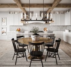 a dining room table with chairs around it