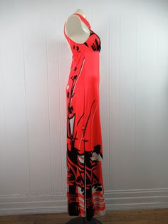 "Vintage 1960s early 70s maxi dress. Made of polyester. Color is red, black and white. Asian inspired. Has a halter style collar with three buttons. Empire waist. Floor length. Made by Jantzen. Size medium. Actual measurements are: 25\" (stretches to 29\") around the waist 32\"(stretches to 36\") around the hips 60\" overall length 29.5\" side vents In very good condition." Red Retro Maxi Dress For Summer, Retro Sleeveless Party Maxi Dress, Retro Sleeveless Maxi Dress For Party, Red Sleeveless Vintage Maxi Dress, Red Sleeveless Lined Maxi Dress, Spring Evening Red Halter Dress, Lined Halter Neck Maxi Dress For Evenings, Red Maxi Length Halter Dress For Party, Halter Neck Lined Maxi Dress For Evening