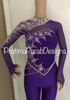 a mannequin wearing a purple leotard with beading on it's chest