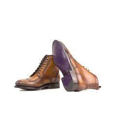 With its beautiful brogue pattern and classic silhouette, the Military Brogue boot is an essential in every man's closet. Reminiscent of a soldier's boots, the Military Brogue boot is equal parts rugged and refined. The Details: *Burnished Materials: cognac box calf Sole: lilac Goodyear welt leather rubber sole Last: Zurigo - Rounded toe for fraditional English Look What is Fast Lane? Fast lane is our new experimental 7 day made to order collection, an ambitious never been heard of before collec Brown Cap Toe Chukka Boots For Business, Formal Cognac Boots With Plain Toe, Formal Cognac Plain Toe Boots, Luxury Wingtip Chelsea Boots With Brogue Detailing, Brown Cap Toe Lace-up Boots With Brogue Detailing, Elegant Brown Chelsea Boots With Brogue Detailing, Brown Cap Toe Chelsea Boots For Formal Occasions, Semi-formal Wingtip Chukka Boots With Rubber Sole, Formal Brown Cap Toe Chelsea Boots