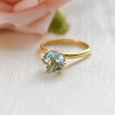 D E T A I L S - Material: 925 Sterling Silver Stone: Blue Topaz Stone Shape:- Round Stone Size:- 8mm The Fit: True to US ring size Finish: Smooth and Gold Plated S H I P P I N G & P R O D U C T I O N - My current production time is 2-6 business days, which means after those days are up, your order ships! I make everything custom to order, by hand, but I promise you it's worth the wait! R U S H - M Y - O R D E R - If you're in a rush to get your pretty new pieces, please send me a message and November Birthstone Ring, Blue Topaz Stone, November Birthstone, Topaz Stone, Proposal Ring, Ring Promise, Quartz Earrings, Blue Topaz Ring, Smokey Quartz