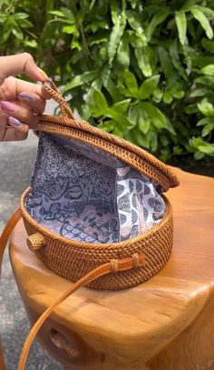 Embrace the beach vibes with our rattan oval crossbody bag. Whether you choose to wear jeans or a summer dress, this accessory will be the perfect addition to your outfit. All these natural and real rattan handbags are free shipping. The size of this rattan crossbody bag is approx 18 cms diameter. Every single one of these rattan handbag is crafted by hand. No two bags are exactly the same, so there might be slight variations in size and color between each bag. Upgrade your summer fashion game w Beach Bonfire Parties, Western Style Interior, Rattan Handbags, Bonfire Party, Beach Bonfire, Cowhide Rugs, Rattan Bag, Boho Living, Cow Hide Rug