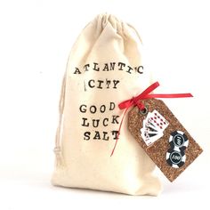 a bag with a tag attached to it that says atlantic city good luck salt