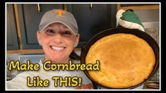 a woman holding up a baked pie in a pan with the words make cornbread like this