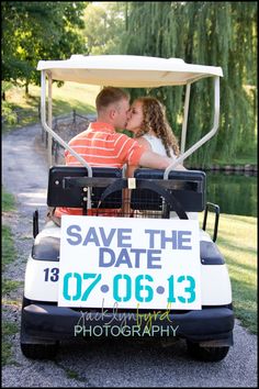 a man and woman in a golf cart with a save the date sign on it