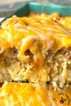 a casserole dish with meat and cheese on it