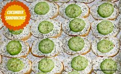 cucumber sandwiches with sprinkles and white frosting in a box