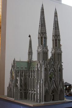 a model of a cathedral is shown on a table