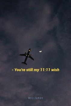 an airplane flying in the sky with a quote above it that reads, you're still my 11 11 wish