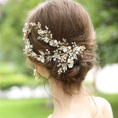 a woman wearing a bridal hair piece