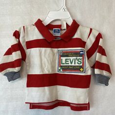 For sale is a Vintage Little Levi’s Long Sleeve Shirt Toddler Youth 2T Hold That Line Striped red and white. This one has a stain on the back of the right sleeve. Looks like grease possibly. No holes. Please see all of the pictures for more detail. Thanks for looking. Grease, Long Sleeve Shirt, Sleeve Shirt, Red And White, Long Sleeve Shirts, Stain, Best Deals, Long Sleeve, For Sale