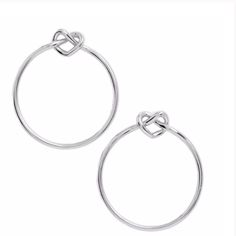 $58 Kate Spade Loves Me Knot Heart Hoop Earrings In Silver We Designed These Loves Me Knot Hoops As An Update To Our Best-Selling Sailor's Knot. If You Take A Second Look, You Might Notice The Knotted Tops Resemble A Heart. It's A Nod To One Of Our Favorite (And Sweetest) Emblems. Material Plated Metal Brass, Cubic Zirconia Features 8.64g Width: 1.5" Details Handcrafted Imported New Silver Kate Spade Earrings Gift, Kate Spade Earrings Stud, Kate Spade Studs, Kate Spade Bangle, Pearl Earring Set, Enamel Stud Earrings, Gold Leaf Earrings, Heart Hoop Earrings, Gold Pearl Earrings