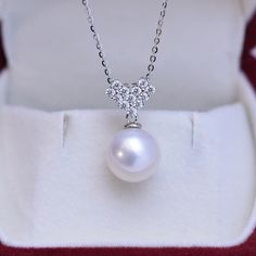 Elevate your style with this 10-11mm freshwater pearl necklace, showcasing a striking white and purple dual-tone pearl. Set within a cubic zirconia-adorned heart pendant, the lustrous pearl offers an enchanting blend of colors. Perfect for adding a touch of elegance to any ensemble, this necklace is a blend of classic allure and modern romance. Ideal as a standout gift or a personal treat. Necklace Chain, material 925 sterling silver, color in gold or white. it is matching with the color of the Diamond White Pearl Necklace Gift, Gift Diamond White Cubic Zirconia Pearl Necklace, Pearl White Pearl Necklace With Diamond Accents For Gift, Pearl White Necklace With Diamond Accents As A Gift, Diamond White Pendant Pearl Necklace As Gift, Diamond White Pearl Pendant Necklace For Gifts, Pearl White Necklace With Diamond Accents For Gift, White Cubic Zirconia Pearl Drop Necklace, Elegant Silver Heart-shaped Pearl Necklace