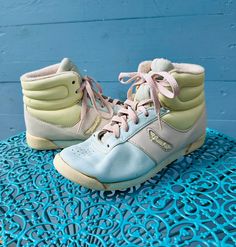 Cool and rare 1980s BassAir pastel sneakers. Estimated size 5.5 (tag reads size 7, though I'm a 7.5 and can't get my foot into them).   Narrower in width. Please allow room for movement and ease Measurements: Width, ball to ball side: 3.75" Length, toe to heel: 9.75"  Height: 5" Condition: good vintage condition, lots of life left! Made from leather, internal terry cloth  Shipping: USPS Standard Post (insurance tracking included) We are happy to ship internationally! *Due to the variability in shipping costs based on location, anything in excess of $2.00 over the actual cost will be refunded.  We can provide a combined shipping cost and/or estimate to your location. Refunds and Exchanges: All sales are final.  You will not be refunded if an item does not fit. Please check the measurements Vintage High-top Sneakers For Streetwear, Vintage Lace-up Sneakers For Sports, Vintage High-top Sneakers With Gum Sole For Streetwear, Vintage Mid-top Sneakers With Rubber Sole, Retro Mid-top Sneakers, Vintage Sports Sneakers With Gum Sole, Vintage Mid-top Sports Sneakers, Vintage Mid-top Sneakers For Sports, Vintage Sneakers With Gum Sole