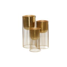 three gold metal vases sitting next to each other on top of a white surface