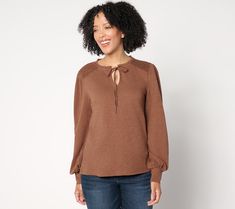 We're absolutely charmed by this calico knit blouse. From the crochet details at the shoulders to the gathered long sleeves to the split V-neckline with ruffle, this sweet style exudes an easy-breezy energy that's a wonderful addition to any day. From Me by Jennie Garth. Cozy V-neck Top With Button Closure, Brown Cotton V-neck Blouse, Brown Knit Button-up Top, Dark Wash Cotton Button-up Blouse, V-neck Stretch Top With Button Closure, Jennie Garth, Knit Blouse, Crochet Details, Easy Breezy