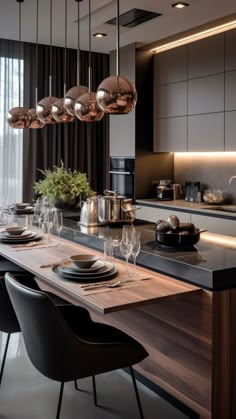 a dining room table with plates and glasses on it