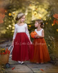 "We are welcoming the fall wedding season with our New Burnt Orange and Rust flower girl dresses.Our whimsical bohemian style special occasion dresses are perfect used as a flower girl dress, birthday dress, dress for photo shoot and also makes a great communion dress or baptism dress. The soft, off white bodice is made of stretch lace and lined with cotton for comfort. The \"V\" shaped backside is jaw dropping, edged with delicate eyelash lace to complete a classic style dress. The skirting is Rust Flower Girl Dress, Orange Flower Girl, Toddler Birthday Dress, Rustic Flower Girl Dress, Boho Flower Girl, Rustic Flower Girls, Toddler Flower Girls, Rustic Boho Wedding, Princess Flower Girl Dresses