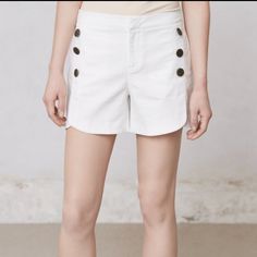 White Anthropologie Cartonnier Sailor Shorts. Whites Sailor Button Detail. Little Tulip Hem Detail. Brand New With Tags. Size 4. Waist Measures About 15”, Rise 9”, Inseam 4” Summer Cotton Shorts With Buttons, Cotton Summer Shorts With Buttons, Chic Summer Shorts With Button Cuffs, Spring High Waist Buttoned Shorts, Casual White Button-up Shorts, Summer Short Bottoms With Buttons, Button-up Shorts For Summer, Chic Buttoned Shorts For Day Out, Summer Shorts With Button Closure For Day Out