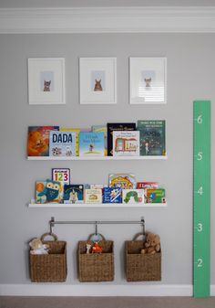 there are books and toys on the shelves in this child's room