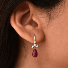 A perfect pair for your big day or the most important ladies of your tribe, these pretty earrings feature a cluster of diamond studded leaves with a Natural Ruby Drop * Diamond Wt. : 0.20 Cts * Color-Clarity Grade : H-I, VS Si * Ruby : 7 ct ( Approx) * Gold - 14K, 1.6 gms yellow gold (for other metal color, please convo) Find us on Instagram for exquisite designs: @abhikajewels Like us on Facebook: www.facebook.com/Abhikajewels Thank you for visiting our shop.. :) Diamond Nose Stud, Diamond Crown, Diamond Dangle Earrings, Ear Rings, Pear Shaped Diamond, Ruby Diamond, Pretty Earrings, Wire Earrings, Natural Ruby