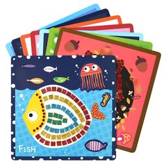 a bunch of cards that are on top of each other, with different designs and colors