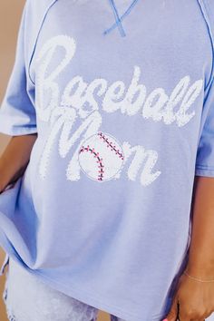 Be the cutest mama at the ballpark with our Baseball Mom Oversized Rhinestone Tee. This baseball mom rhinestone graphic tee is perfect for those summer days spent at the park cheering on your kids! Make sure you're prepared to turn heads! Round neckline Short sleeves Rhinestone detail Baseball mom graphic tee Fabric: 85% Cotton, 15% Polyester MEASUREMENTS:S: CHEST: 23”M: CHEST: 24”L: CHEST: 25” Model Specs: Karli is wearing a size small in the photo.How will this item fit you? Check out our MODE Style Wide Leg Jeans, Bride Top, Rhinestone Tees, Mom Graphic Tees, Mom Lifestyle, Baseball Outfit, Vip Group, Exclusive Dress, Everyday Chic