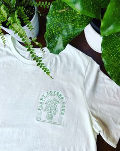 Plant Lovers Club T-shirt Embroidered Custom Colors Green Thumb Garden Club Plants Bella + Canvas Brand Citron green shirt with medium green stitching.  4.2 oz., 100% combed and ringspun cotton Plant Tshirt, Plant T Shirt, Daisy Patches, Embroidered T Shirt, Plant Logos, Garden Shirt, Monochrome Fashion, Club T Shirt, Embroidered Tee