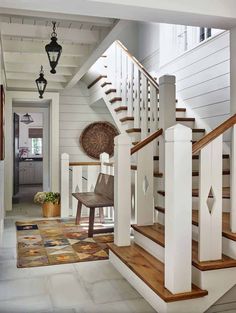 the stairs in this house are painted white