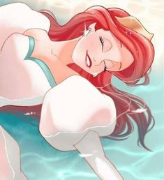 the little mermaid is swimming in the water with her long red hair and eyes closed