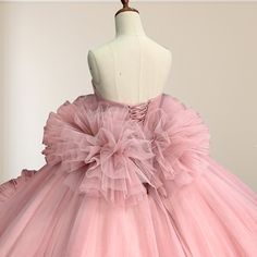 Step into a fairytale with this Pink Strapless Sleeveless Ball Gown Corset Quinceanera Dress. This dress's soft pink hue exudes romance and charm, perfect for your grand celebration. The strapless neckline beautifully highlights your shoulders and collarbones, while the sleeveless design adds a timeless and elegant touch. The voluminous ball gown silhouette is enhanced with cascading ruffles that bring drama and movement to your look. The corset back ensures a flawless fit, accentuating your fig Corset Quinceanera Dresses, Ball Gown Corset, Sleeveless Ball Gown, Gown Silhouette, Quinceanera Dresses Pink, White Homecoming Dresses, Blue Homecoming Dresses, Gown Style, Cascading Ruffles