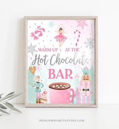 a sign that says warm up at the hot chocolate bar on top of a shelf