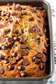 a loaf of chocolate chip banana bread in a pan