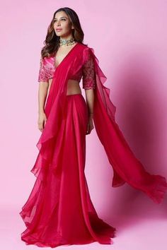 Shop for Ridhi Mehra Pink Net Flann Draped Ruffle Saree With Blouse for Women Online at Aza Fashions Luxury Bollywood Pre-draped Saree With Border, Luxury Pre-draped Saree With Dori Work For Diwali, Luxury Elegant Net Pre-draped Saree, Luxury V-neck Pre-draped Saree, Luxury Pre-draped Saree With Pallu In Net, Luxury Pre-draped Ruffled Saree For Navratri, Luxury Pre-draped Multicolor Saree With Cutdana, Luxury Pre-draped Saree For Puja, Luxury Pre-draped Sleeveless Saree With Ruffles