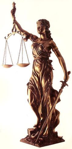 a statue of lady justice holding the scales of justice in front of a white background