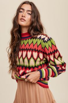 *sold out sizes should be restocked in early November*- Full of heart mock neck puff sleeve knit sweater - Multi color heart shape knitted - Puff long sleeves - Ribbed on neck, cuffs and hem - Model is 5' 7" 31-24-35 and wearing a size Small 52% Acrylic 25% Nylon 23% Polyester Knitted Design, Puff Sleeve Sweater, Color Heart, Sweater Fits, Puff Long Sleeves, Heart Pattern, Sheer Fabric, Sweater Making, Beautiful Heart