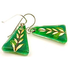 Shop Now at MyAmericanCrafts for these vibrant Leaf Triangle Earrings by Momo Glassworks. Handcrafted Fused Glass Jewelry using Mineral and Metal Oxides to create beautiful handmade images. Leaf is part of the FLORA&FAUNA collection. A stunning combination of nuanced green oxides, silvery leaves of mica, and up-cycled copper wire confer an organic spirit of nature and growth to this design. Fused Glass Jewelry, Flora Fauna, Glass Fusing, Triangle Earrings, Snow Jacket, American Crafts, Glass Jewelry, Copper Wire, Fused Glass