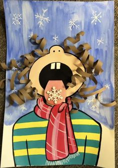 a paper cut out of a man with his mouth open and scarf around his neck