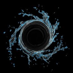 water splashing in the air on a black background