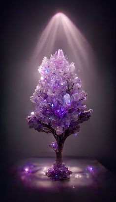 a purple tree with lights shining on it