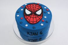 a spiderman cake with stars on it