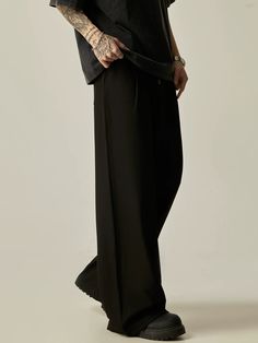 These Multi-Button High-Waisted Wide-Leg Trousers offer a sleek and stylish look with their high waist and wide-leg design. The multiple buttons add a unique touch while also providing a secure fit. Perfect for any occasion, these trousers are a must-have for your wardrobe. ■size(cm) Length Waist Hips S 100 66 94 M 102 70 98 L 104 74 102 XL 106 78 106 ■model 174cm 61kg L ■material polyester 80% viscose 20% Black Solid Color Bottoms For Workwear, Solid Bottoms With Button Closure For Night Out, Night Out Bottoms With Button Closure, Casual Wide-leg Dress Pants With Button Closure, Formal Baggy Wide-leg Bottoms, Casual Wide Leg Dress Pants With Button Closure, Wide Leg Streetwear Pants, Versatile Black Wide Leg Pants For Formal Occasions, Black High Waist Bottoms