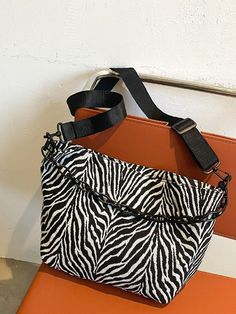 Bag For Love - Zebra Striped Pattern Shoulder Bag - Women Shoulder Bags Product Description Color Black and White Strap Type Adjustable Strap Type Chain Pattern Type Zebra Stripe Style Fashionable Bag Size Medium Quantity 1 piece Type Square Bag Composition 100% Cotton Material Canvas Size Chart INCH CM Size Bag Width Bag Height Bag Length Strap Length one-size 4.3 10.2 10.2 47.2 Size Bag Width Bag Height Bag Length Strap Length one-size 11 26 26 120 Similar Products h2 { text-align: center; } . Everyday White Zebra Print Bag, Everyday Zebra Print Shoulder Bag, Everyday Use Zebra Print Shoulder Bag, Black Zebra Print Bag For Daily Use, White Rectangular Bag With Zebra Print, Black Zebra Print Bags For Daily Use, Trendy Black Zebra Print Bags, White Zebra Print Shoulder Bag, Chain Pattern