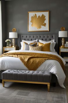 a bedroom with gray walls and gold accents