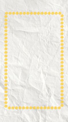 a piece of white paper with yellow dots and a square in the middle on it