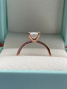 New In! Spring 2023 The Alessandra in rose gold vermeil. 💎This beautiful engagement ring features 2CT radiant cut stone on a minimalistic 1.8mm Sterling Silver band plated with a thick layer of rose gold. A truly elegant and timeless design.  💎Made of high quality sterling silver and  plated with rose Gold it will not rust or turn your finger green. 👉Please be aware that plated jewelry can wear off over time, if this is a concern we would suggest going with the sterling silver ring plated with Rhodium.  ❗️Please note: Even though we apply thick layer of gold we strongly recommend to avoid lotions, harsh chemical and water to make sure gold stays on.  💎Will come in a box ready for a Gift  Will be shipped within 1-2 business days from Los Angeles CA -------------------------------------- Ring Plate, Beautiful Engagement Rings, Radiant Cut, Spring 2023, Sterling Silver Bands, Jewelry Plate, Silver Band, Gold Vermeil, Silver 925