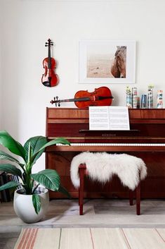 a piano and some musical instruments in a room